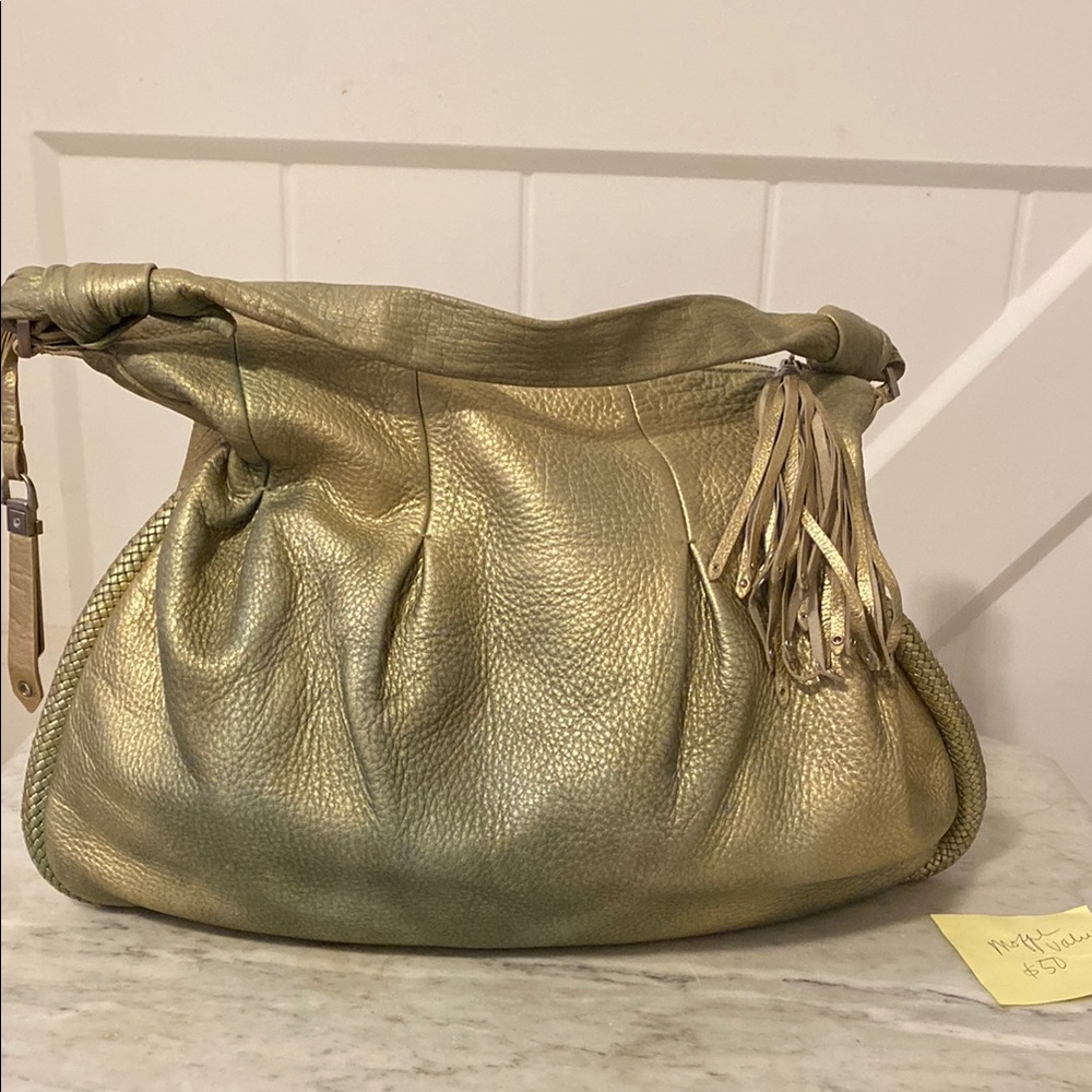 682  Cole  Haan metallic leather hobo bag inside no callouts